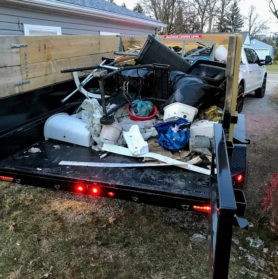 Roll-off dumpster delivered to a residential driveway in Gering